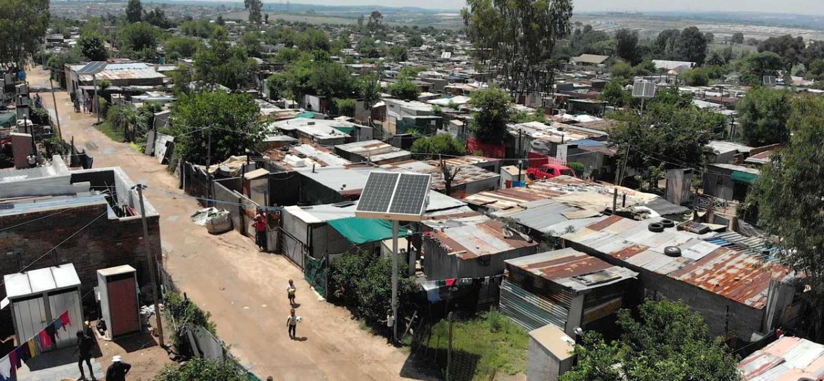 Arial of an off-grid energy distribution solar tower unit in Diepsloot, Gauteng, South Africa