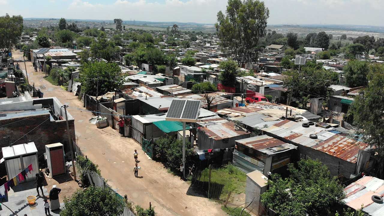 Arial of an off-grid energy distribution solar tower unit in Diepsloot, Gauteng, South Africa