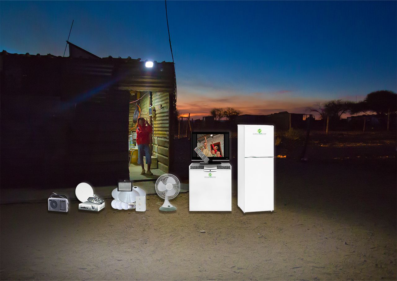 Child enjoys light from DC Microgrid electrification. Powering low-voltage appliances is shown in the foreground , fridge, freezer, television 