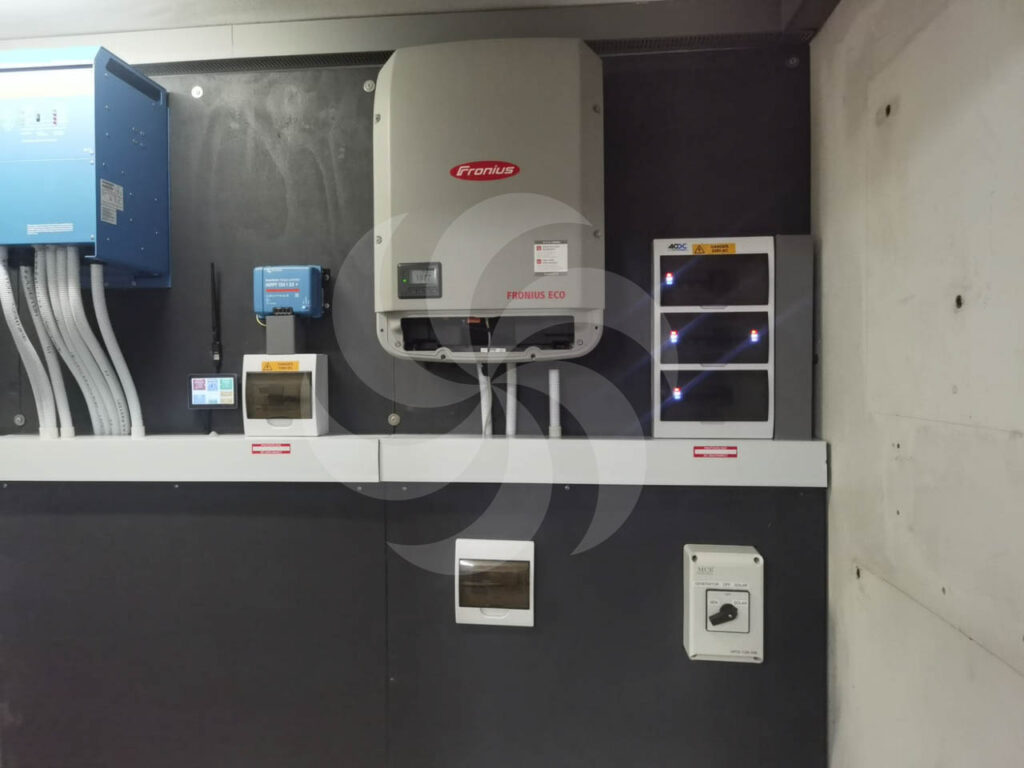 off-grid installation,  image of inverter, fusing and charge controller