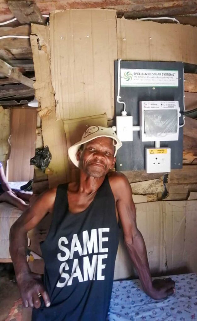 Happy electrification beneficiary at the Thembalethu AC Solar Electrification   Pilot Project 