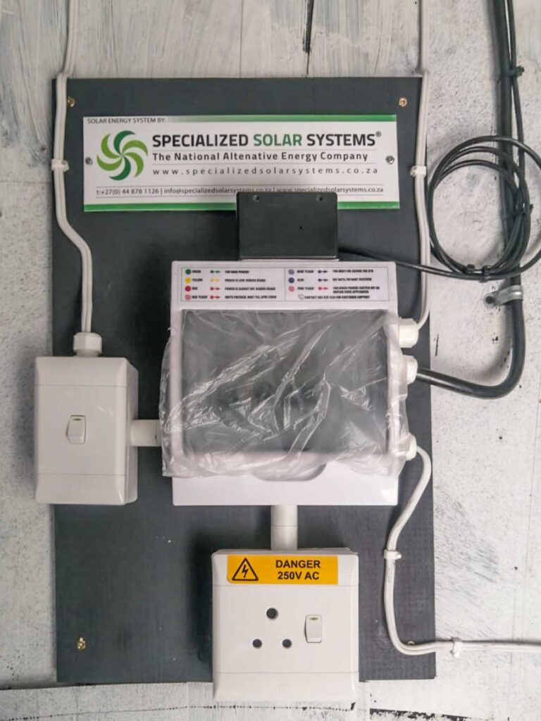 The distribution board used in each household with LED display box in the Thembalethu AC Solar Electrification   Pilot Project 