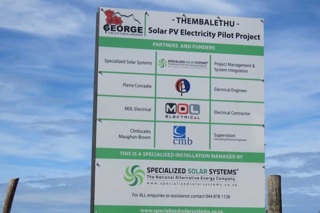 Project signboard at the Thembalethu AC Solar Electrification Pilot Project 