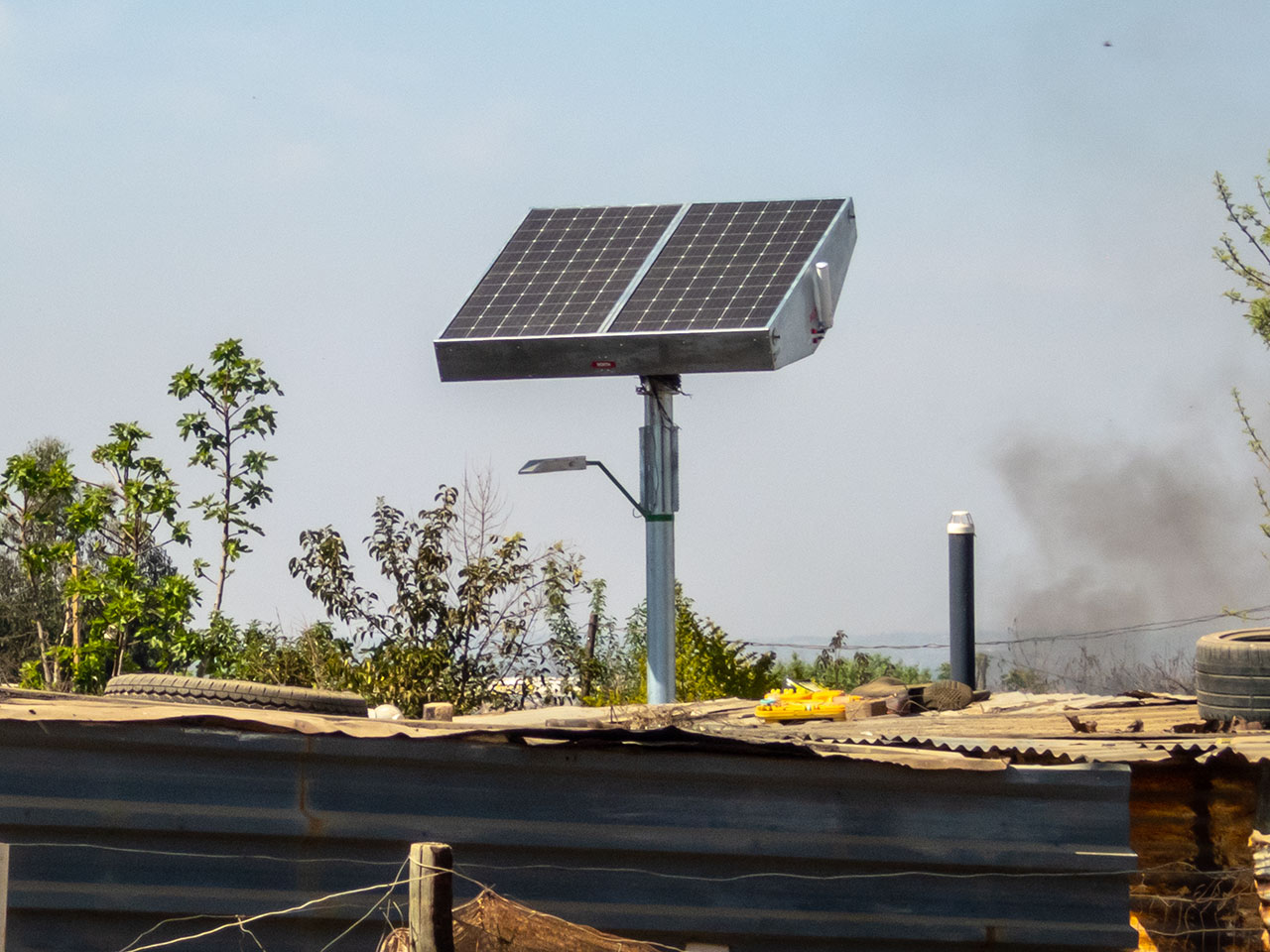 Solar tower (off-grid DC Microgrid) with a street light in Diepsloot, South Africa , enabling security and safetly