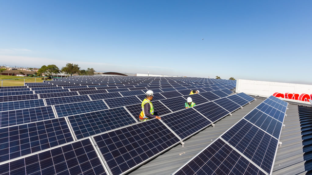 200kWp solar array (PV) with technicians for grid-tie solar power system in George