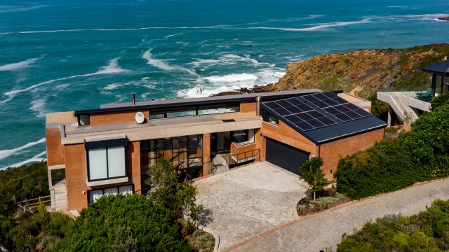 Rooftop solar panels on a home in George installed by Specialized Solar Systems